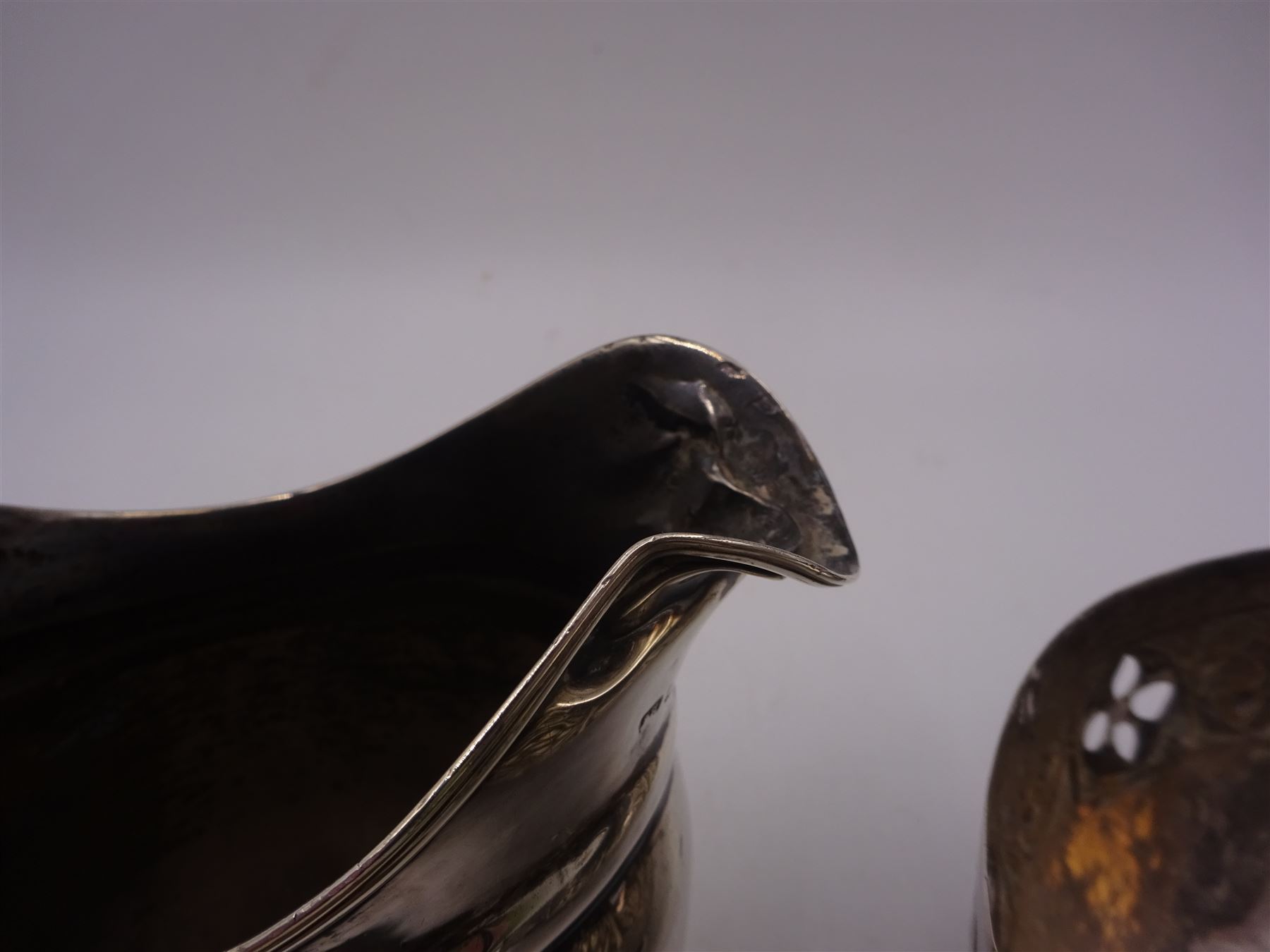 Group of silver, comprising milk jug, miniature trophy, napkin rings and cigarette cases, all hallmarked together with a continental silver bowl with pierced sides, jug H10cm