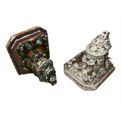 Two Victorian polychromed plaster cast corbels or wall brackets, canted rectangular tops over moulded edge and curled fruiting foliage