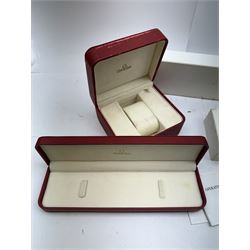 Collection of watch boxes, cases and pouches, predominantly Omega 