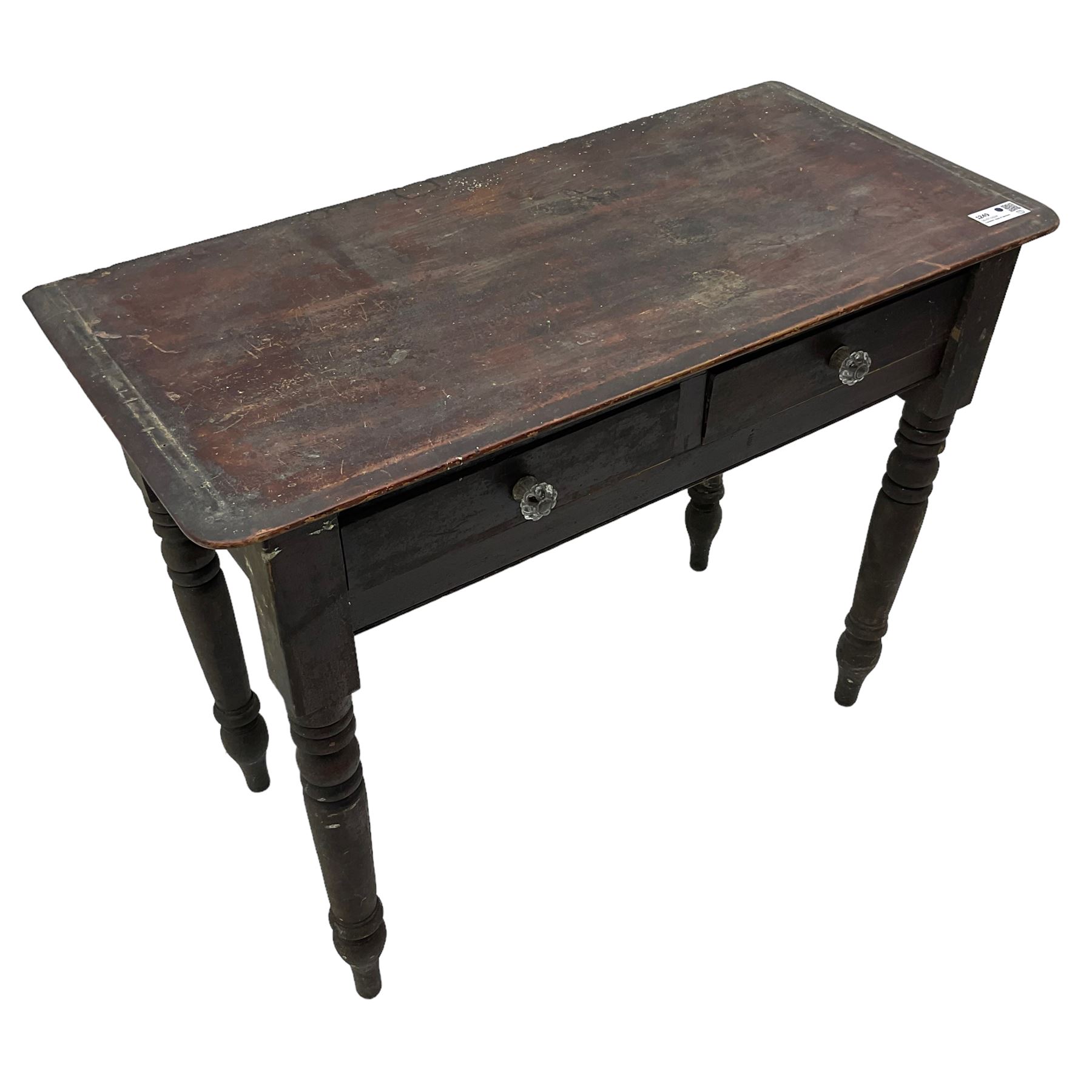 Victorian painted pine side table, moulded rectangular top over two drawers, on turned supports 