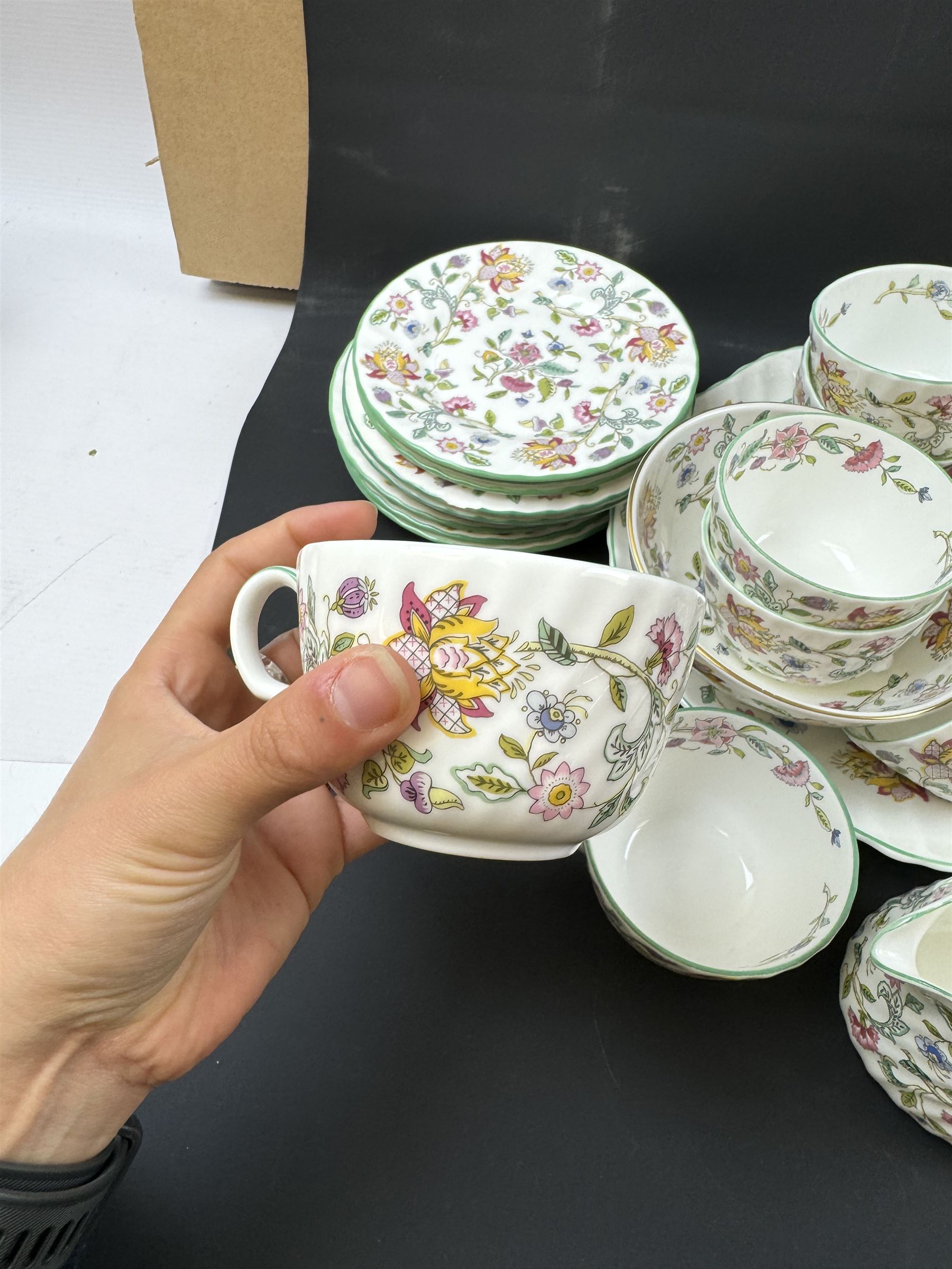 Minton Haddon Hall pattern part tea service, including milk jug, open sucrier, teacups and saucers, dessert plates etc