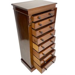 Victorian mahogany Wellington chest, the rectangular top over eight graduating drawers, hinged and lockable upright, with carved and fluted mounts, on plinth base