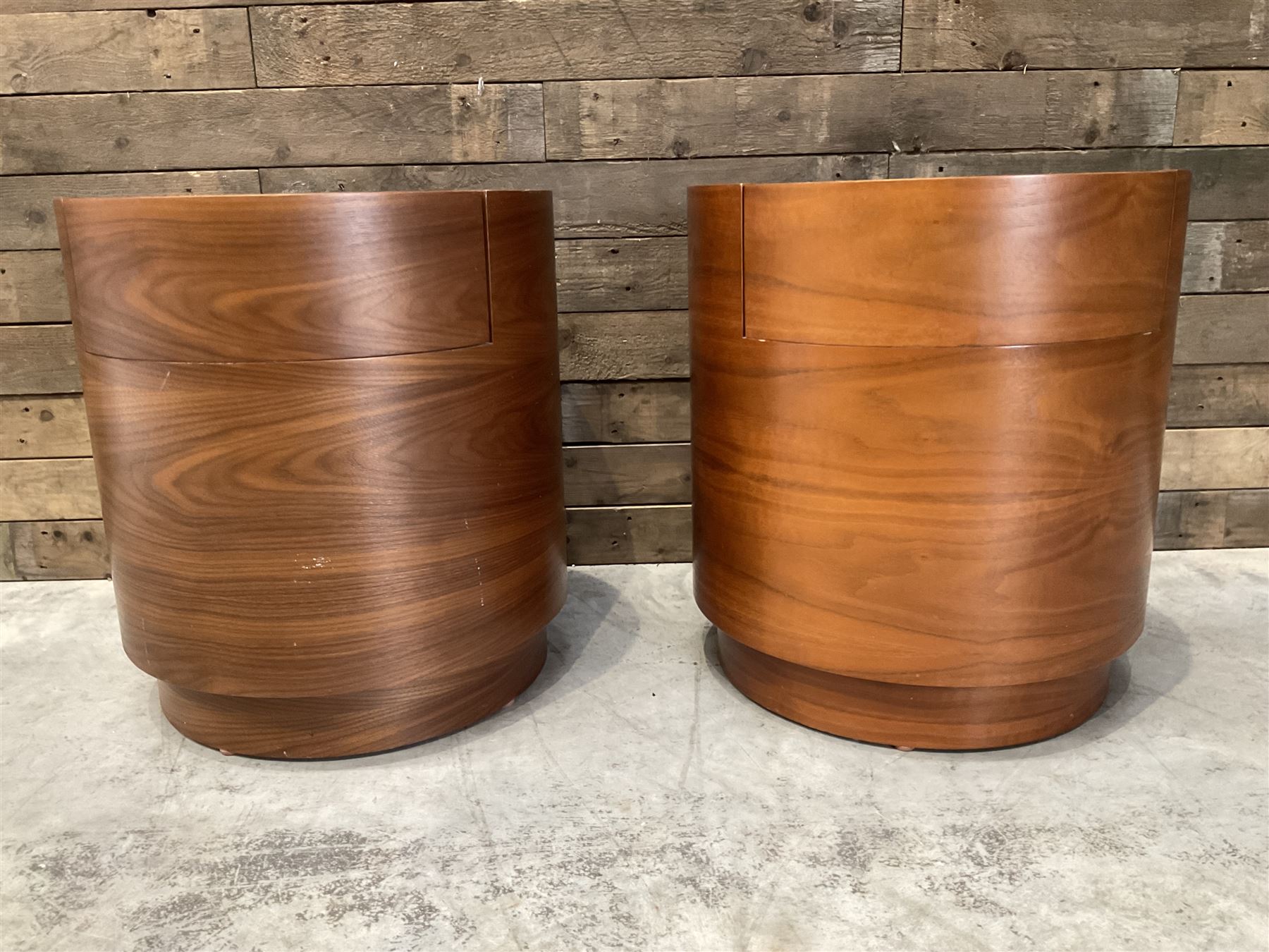 Pair of walnut circular barrel shaped lamp tables, fitted with single drawer