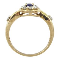 9ct gold oval cut sapphire and round brilliant cut diamond cluster ring, with diamond set shoulders, hallmarked