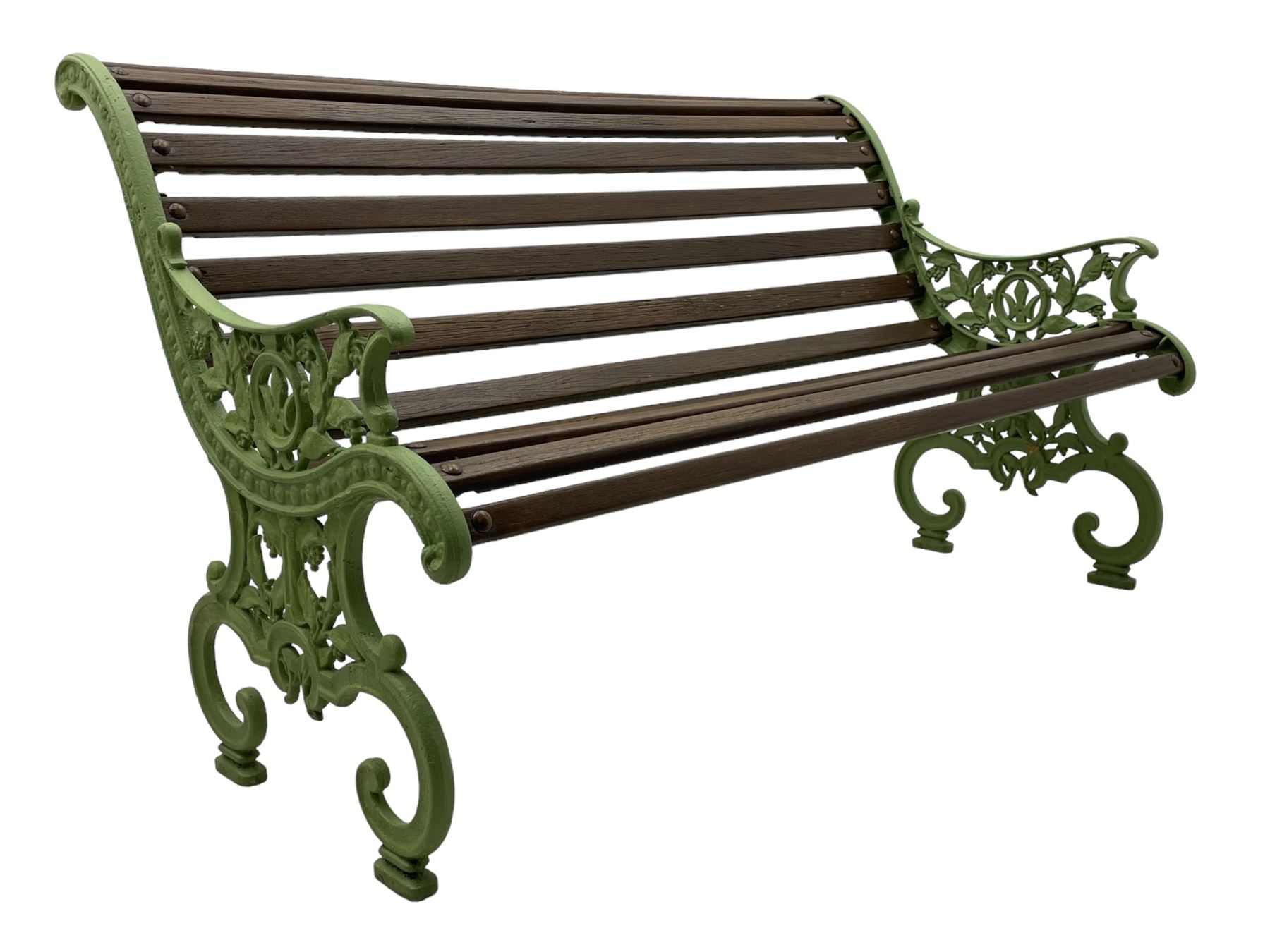 20th century cast iron and wood slatted 'Lilly of the Valley' garden bench, cast iron bench ends of scrolled form decorated with trailing foliage and flower heads, on scrolled supports 