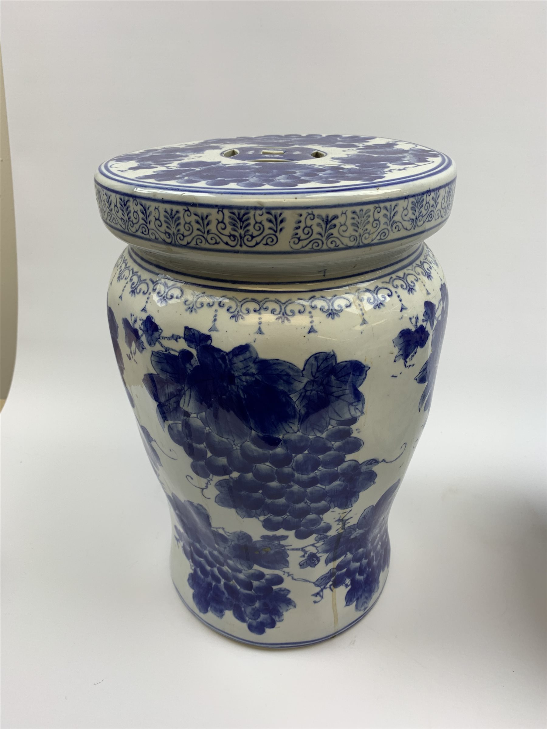 A selection of blue and white ceramics, to include a garden seat, Spode planter, Spode tea caddy, and various urns and covers and vases with Oriental style decoration. 