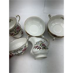 Royal Staffordshire Mandarin pattern tea and dinner wares, including six dinner plates, six side plates, serven twin handled bowls, covered dish etc 