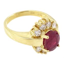 14ct gold oval cut ruby and round brilliant cut diamond cluster ring, stamped, ruby approx 2.00 carat, total diamond weight approx 0.40 carat