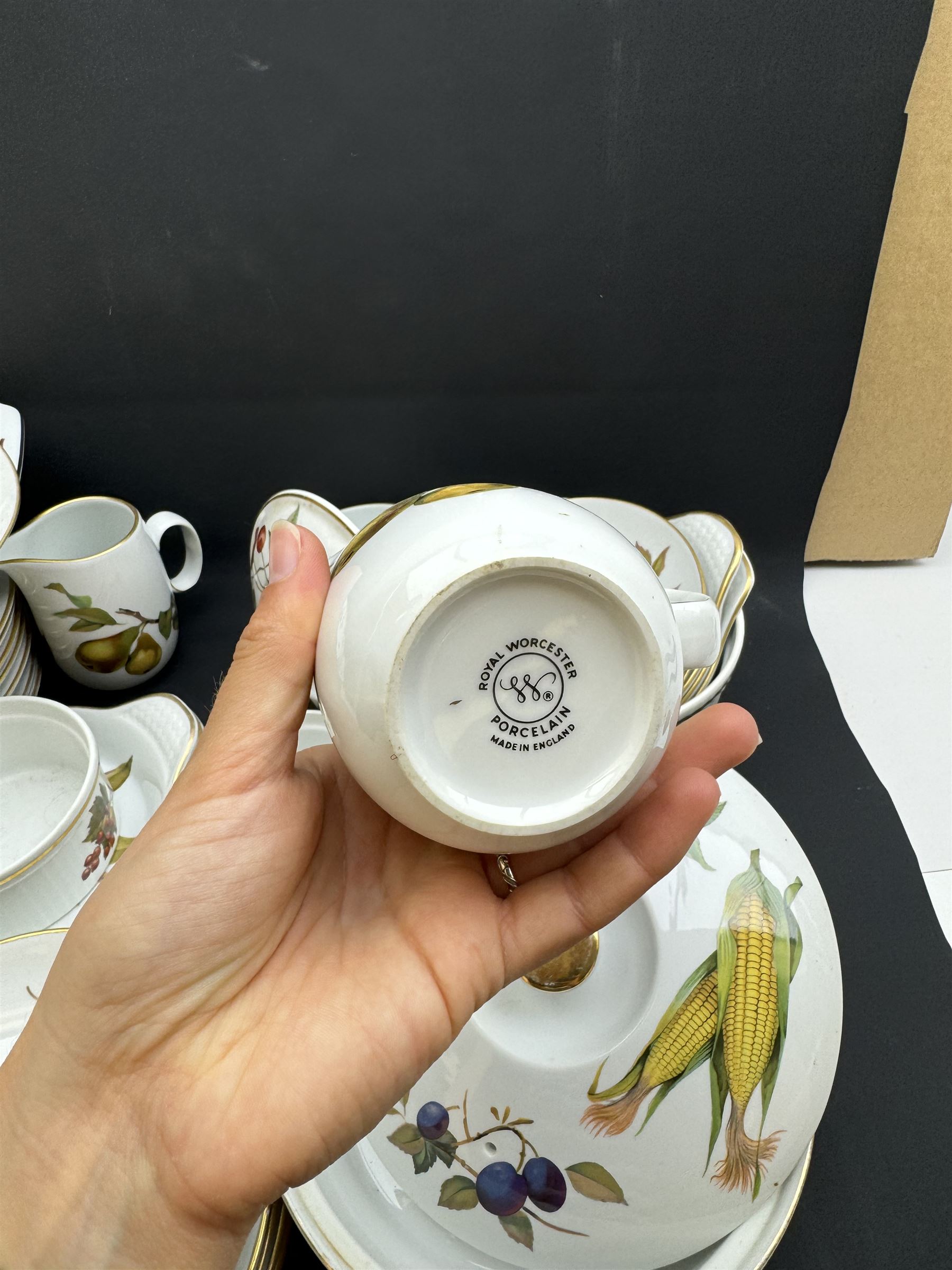 Royal Worcester Evesham pattern part tea and dinner service, including teapot, eight dinner plates, eight side plates etc 