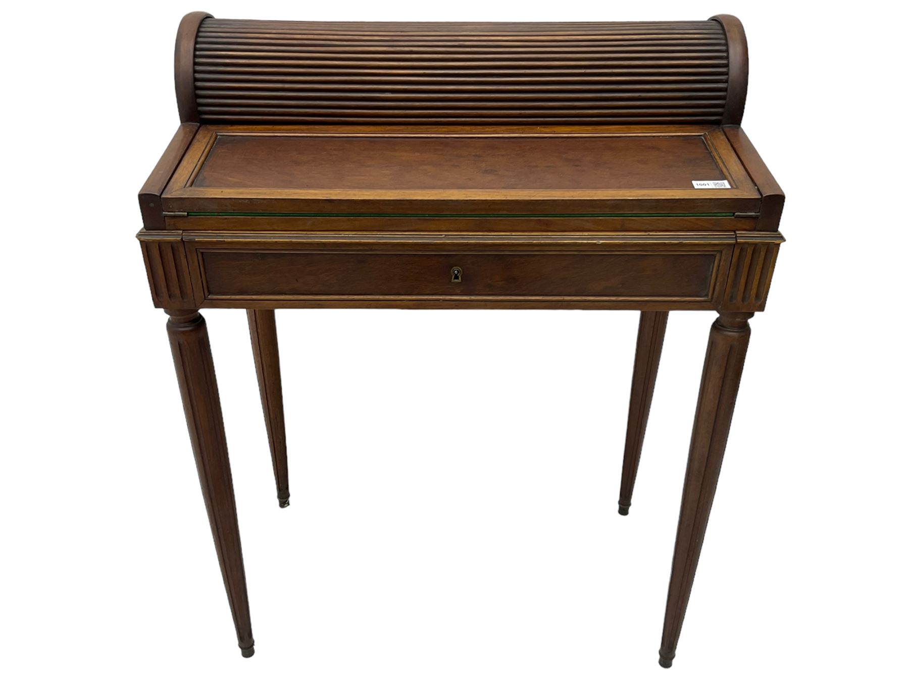 Early 20th century French plum pudding mahogany petite writing desk, barrel tambour roll top, fitted with a single cock-beaded drawer activating the tambour roll, the fold-over writing slope with inset writing surface supported by long drawer, fitted with three small drawers and pen rail, raised on fluted tapering supports