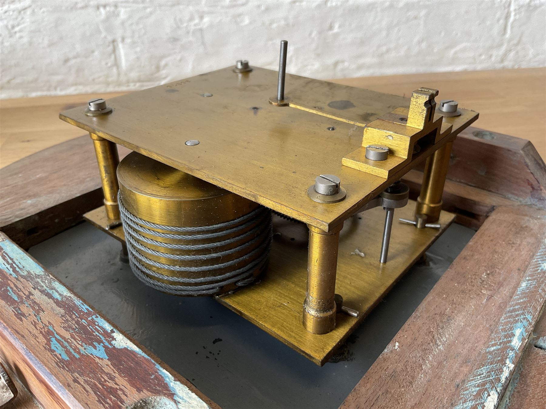 English - early 20th century mahogany cased 8-day fusee wall clock, with a  9”  painted dial ,spun bezel and flat glass,  Roman numerals, minute markers and steel spade hands, wire driven fusee, with pendulum.