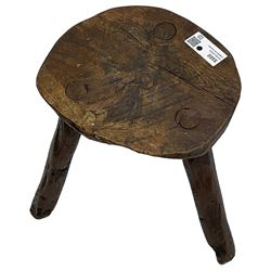 Rustic oak three-legged stool