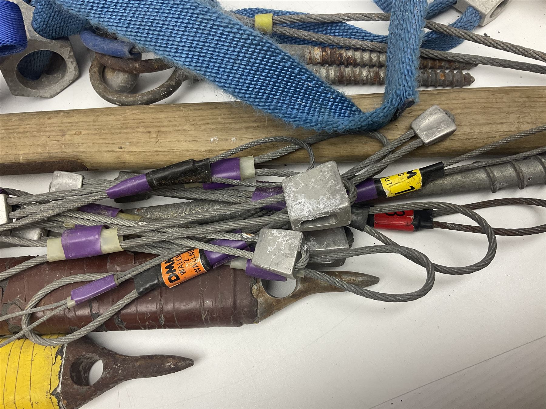 Collection of 1960s/70s climbing equipment including two original Hamish McInnes Pterodactyl ice axes, Joe Brown helmet, carabiners, ropes and wires etc