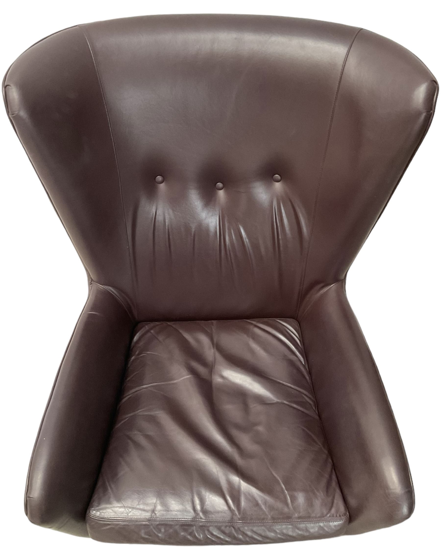 Wing back armchair upholstered in cocoa brown leather