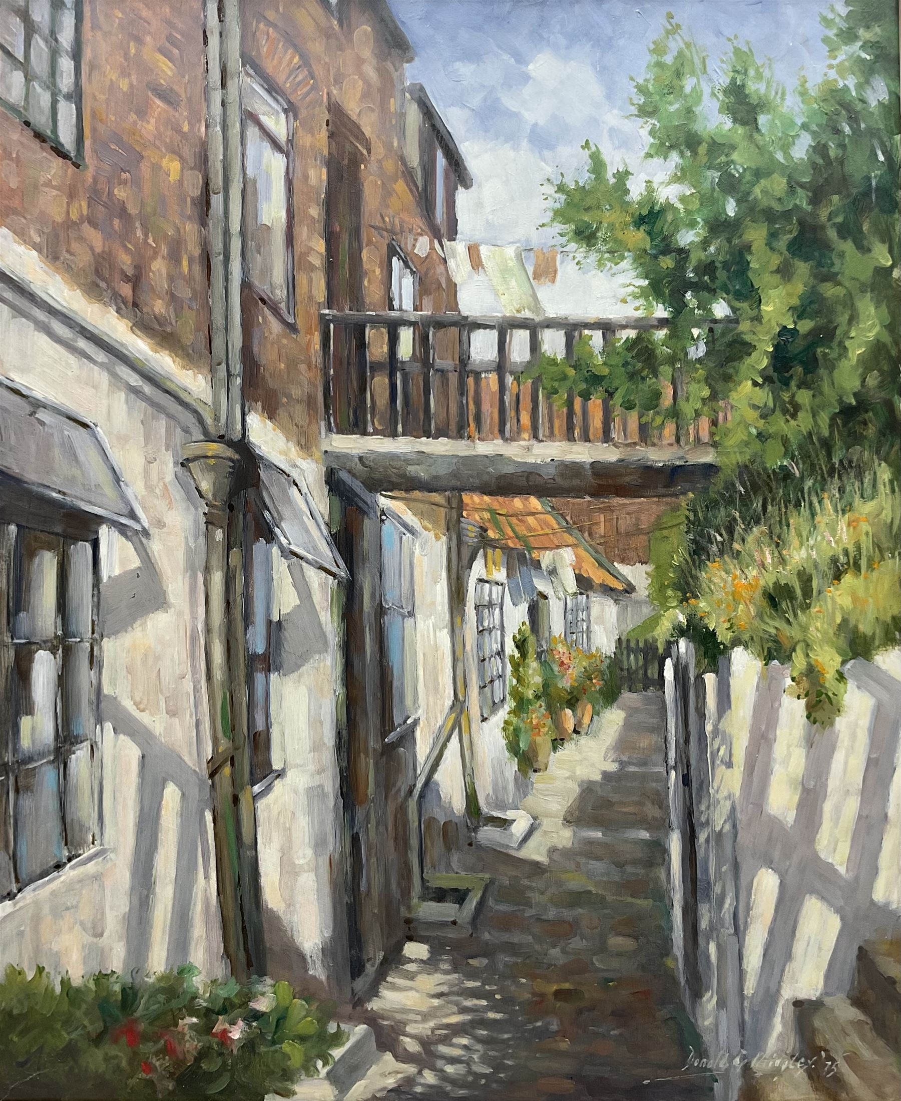 Donald Gray Midgely (British 1918-1995): Street in Robin Hood's Bay, oil on board signed and dated '75, 55cm x 45cm