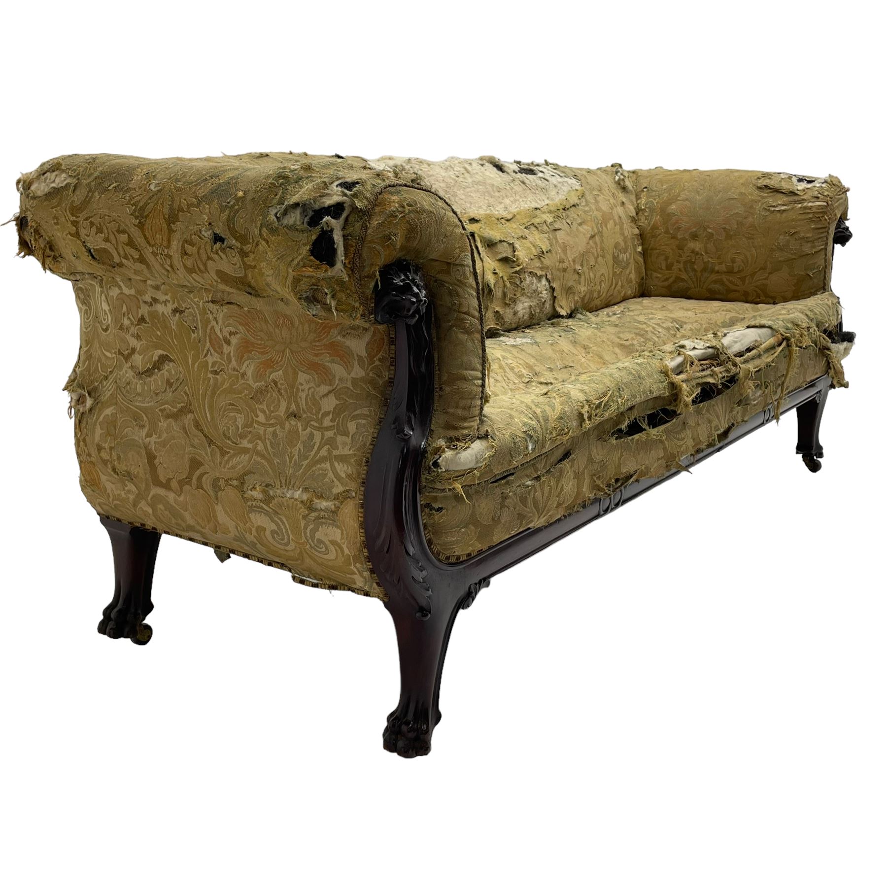 19th century mahogany settee, rolled S-scrolled arms carved with lion masks and acanthus leaf scrolls, the lower moulded rail carved with scrolling design, raised on carved paw feet with recessed brass and ceramic castors 