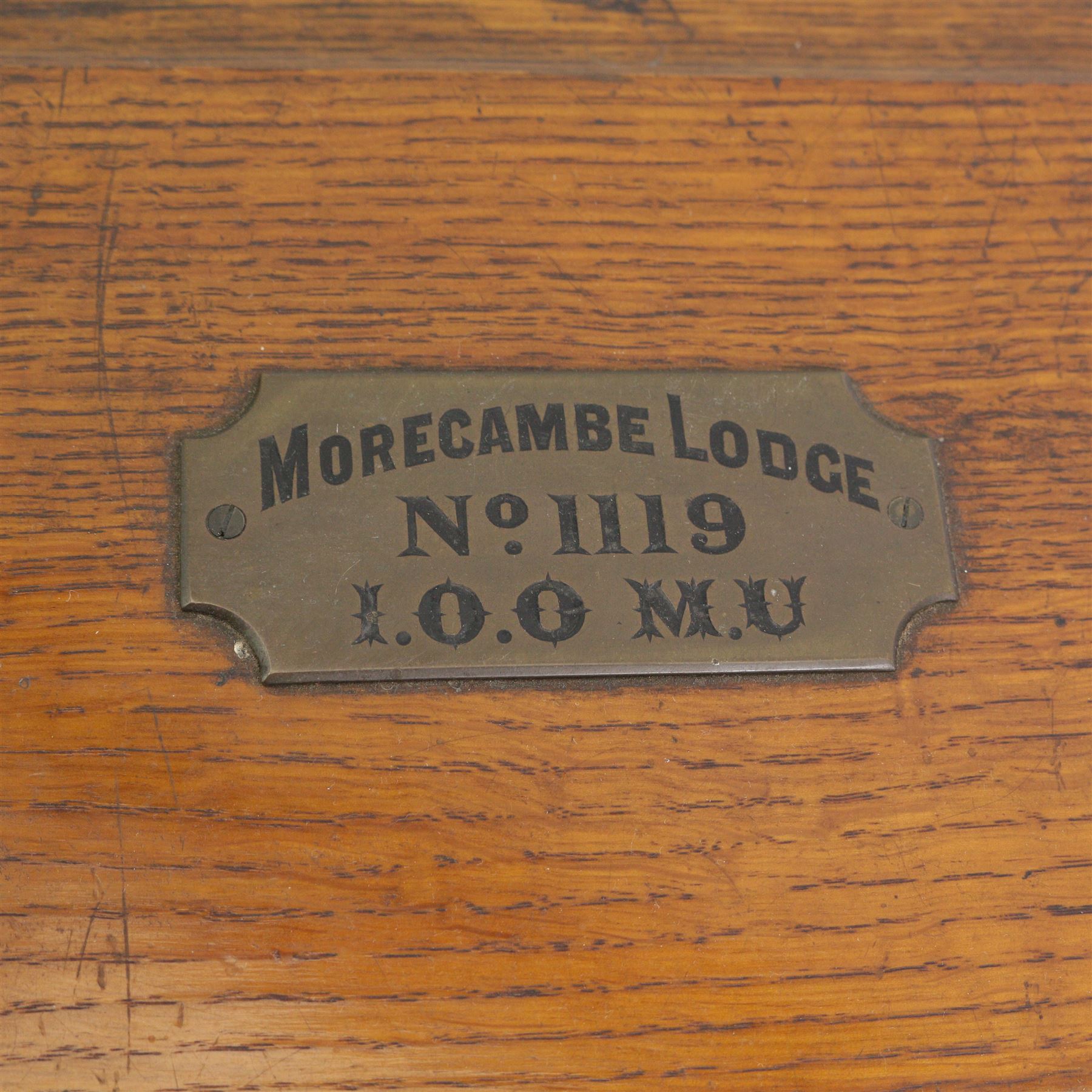 Victorian oak brass bound masonic casket, the cover with plaque engraved 'Morecombe Lodge, No. 1119, 1.0.0. M.U', on four brass lion paw supports, L40cm, H17cm, D30cm