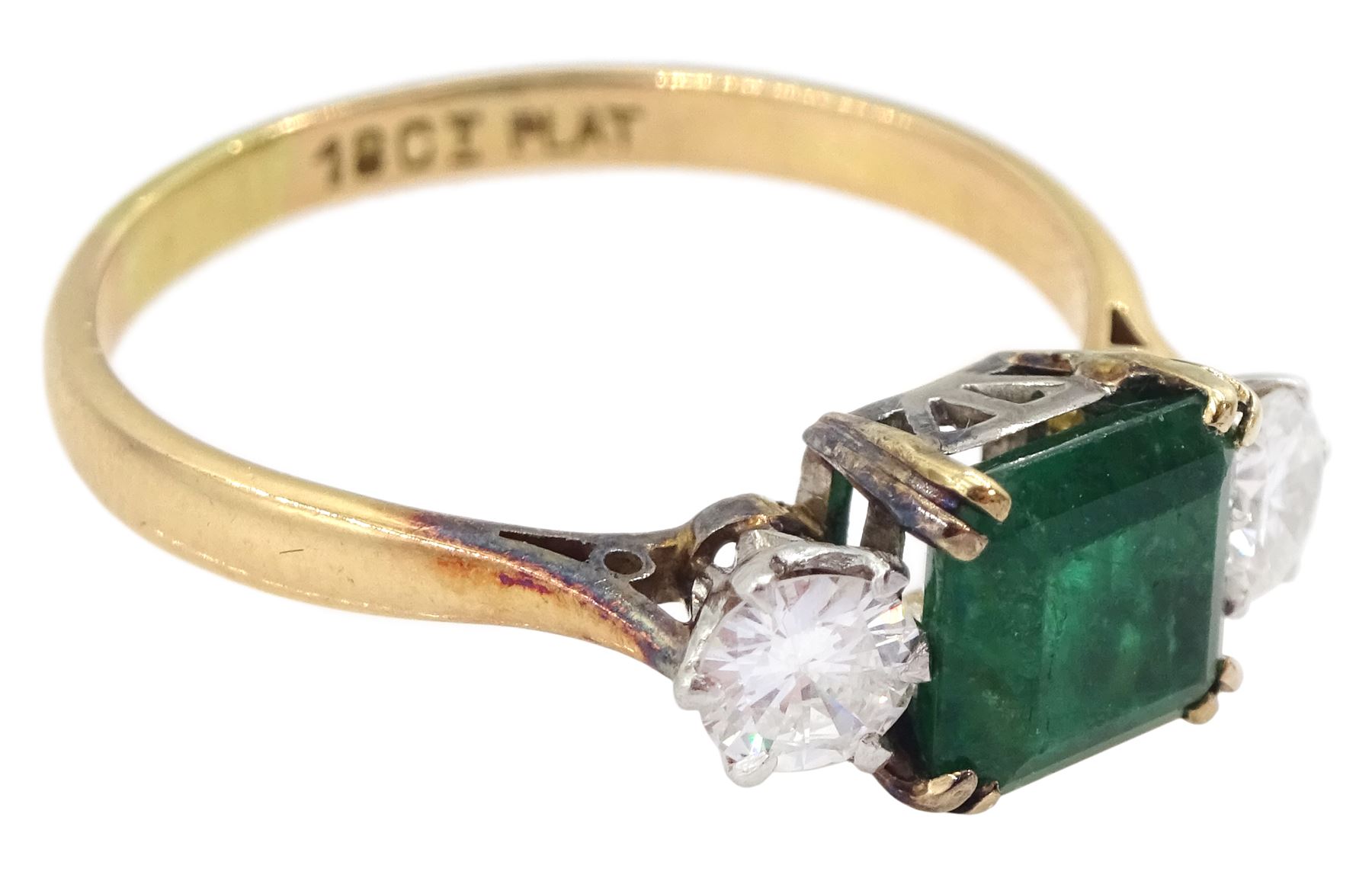 Gold three stone emerald and round brilliant cut diamond ring, stamped 18ct Plat, emerald approx 1.20 carat, total diamond weight approx 0.50 carat