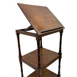 Regency mahogany etagere, the hinged and adjustable top over two tiers and single drawer, turned supports on brass cups and castors 