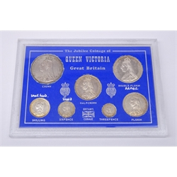  Queen Victoria Jubilee Head coins in a display case 1887 threepence to double florin and an 1889 crown, seven coins in total  