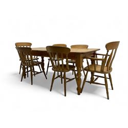 Pine farmhouse dining table, rectangular top with rounded corners, raised on turned suppor...