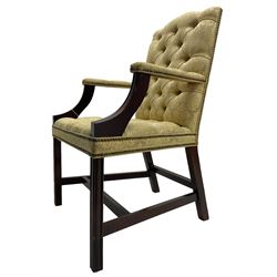 Georgian design mahogany framed Gainsborough open armchair, upholstered in pale gold buttoned fabric with floral pattern, on square moulded supports united by plain stretchers 