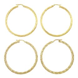 Two pairs of gold twist design hoop earrings, both hallmarked 9ct