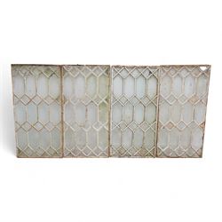 Four Victorian white painted cast iron window panels, 45cm x 90.5cm