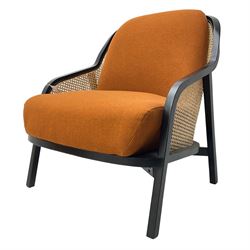 Contemporary MADE Anakie armchair, black lacquered frame with cane backrest, orange fabric upholstered seat and back cushion, sloped armrests, on splayed supports