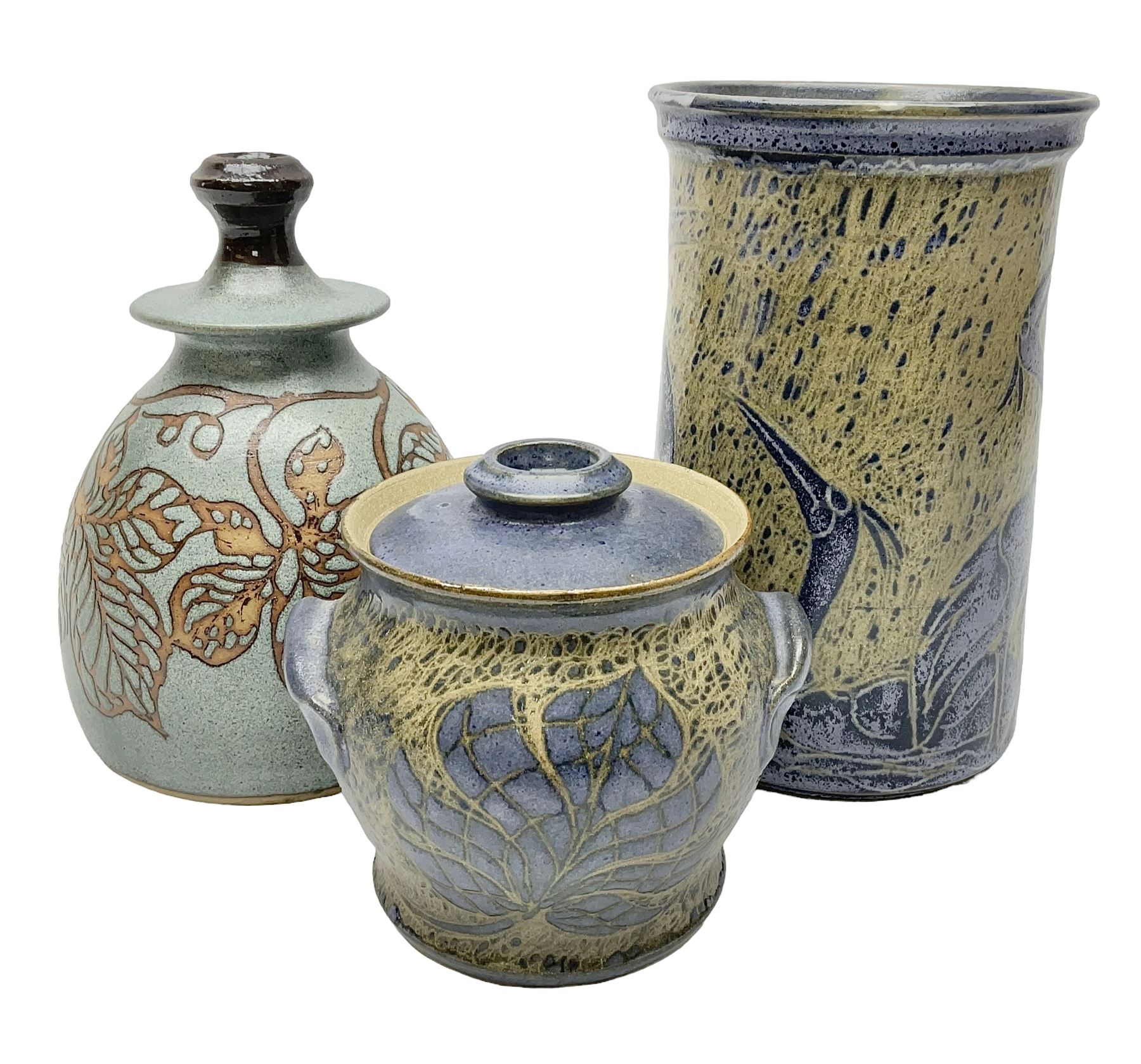 John Egerton (c1945-): studio pottery stoneware, comprising wine cooler decorated with herons on a mottled ground, covered storage jar with foliage decoration and a lamp base decorated with grape vines, wine cooler H23cm