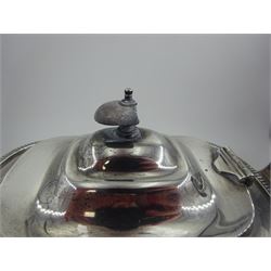 1930s silver three piece tea service, comprising teapot, open sucrier and milk jug, each of oval form with oblique gadrooned rim, the teapot with Bakelite handle and finial, hallmarked James Dixon & Sons Ltd, Sheffield 1932