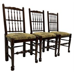 Set of six (4+2) 20th century oak spindle back dining chairs, with upholstered drop-on seat cushions, turned supports joined by turned stretchers