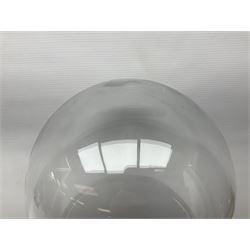 Glass dome upon circular base, H52cm