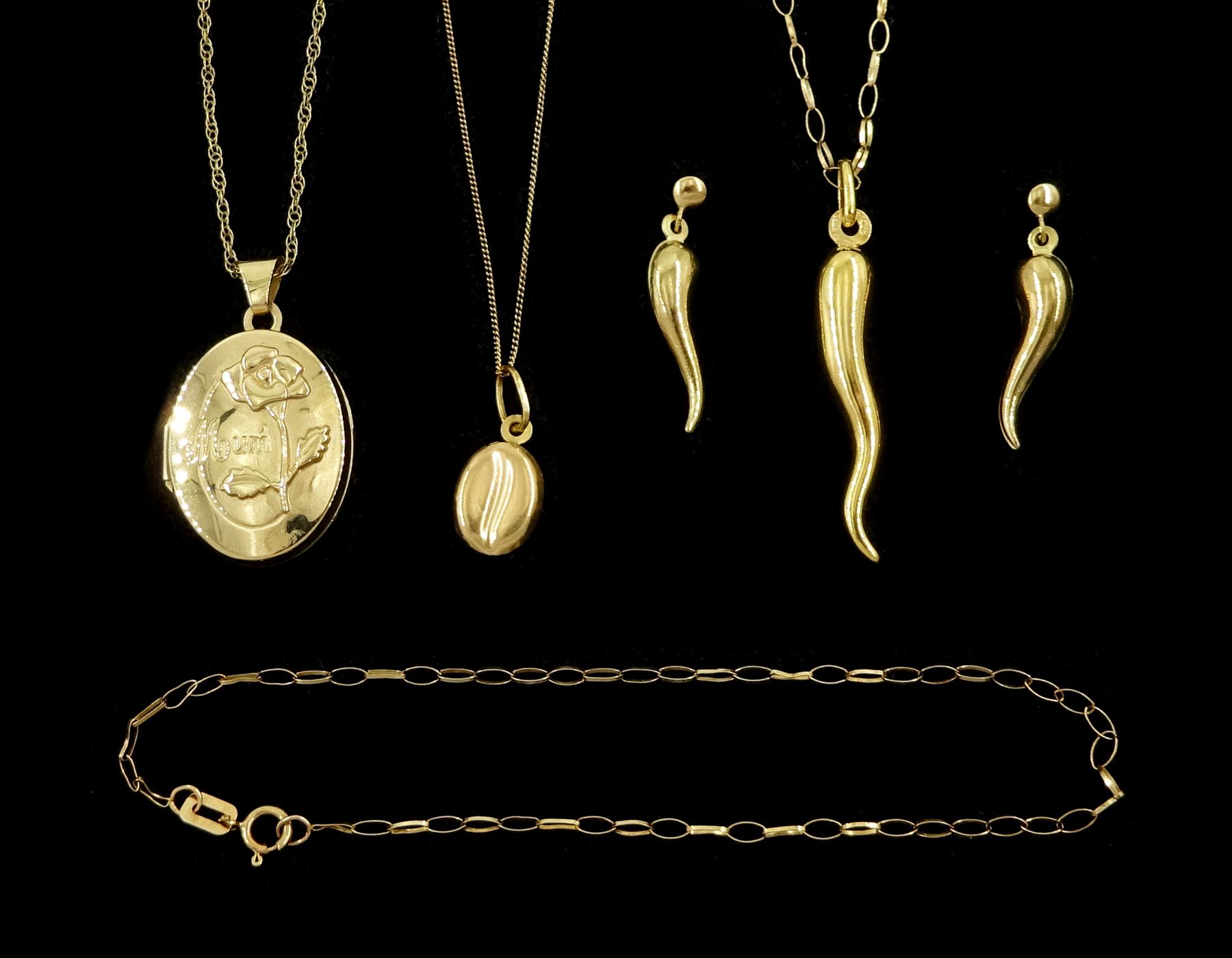 Three gold necklaces including coffee bean, locket and cornicello, pair of matching stud earrings and a gold bracelet, all 9ct