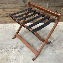 Ten walnut finish folding luggage stands