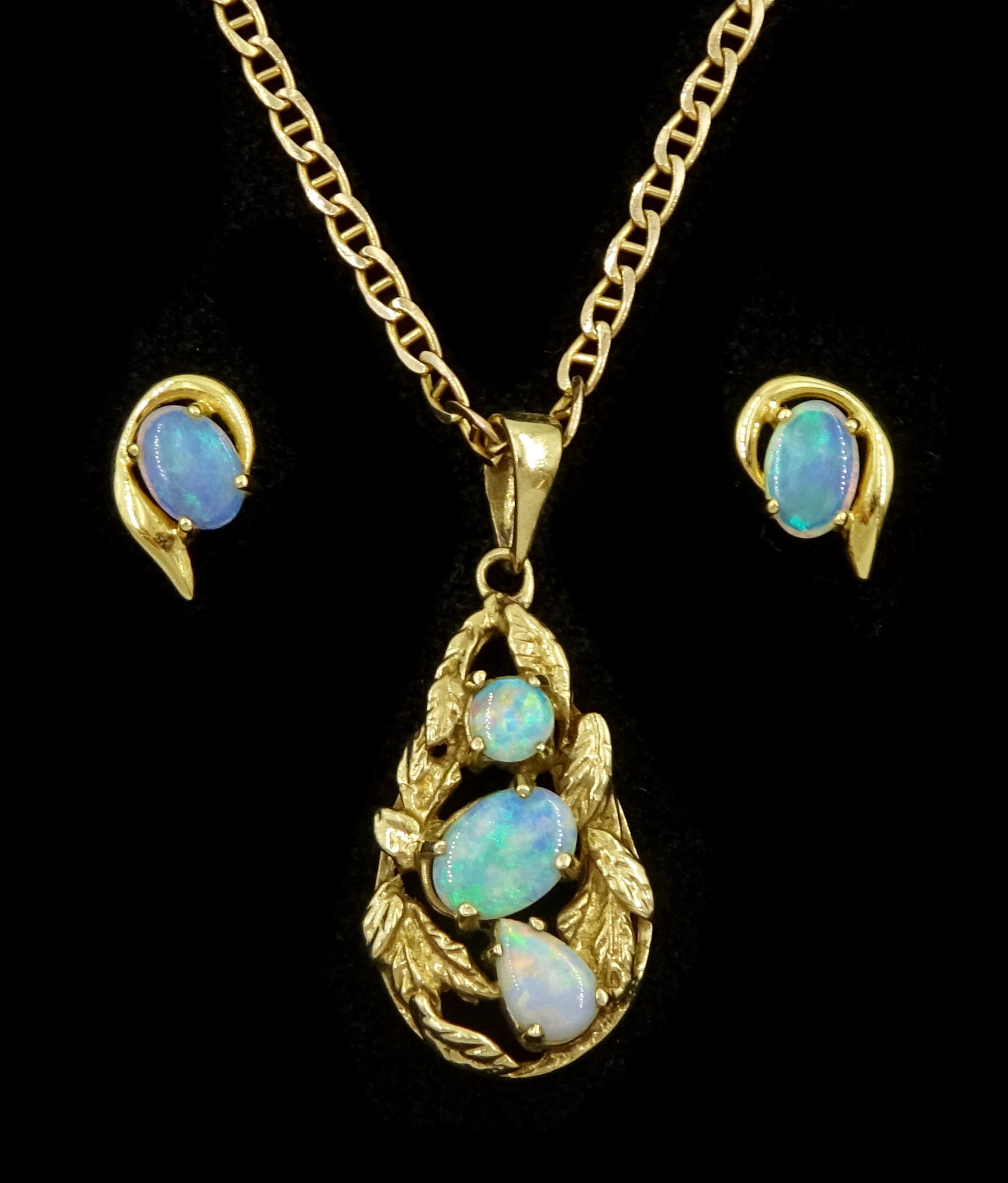 Gold opal link pendant, on gold mariner link chain necklace, both 9ct and a pair of 18ct gold opal triplet stud earrings