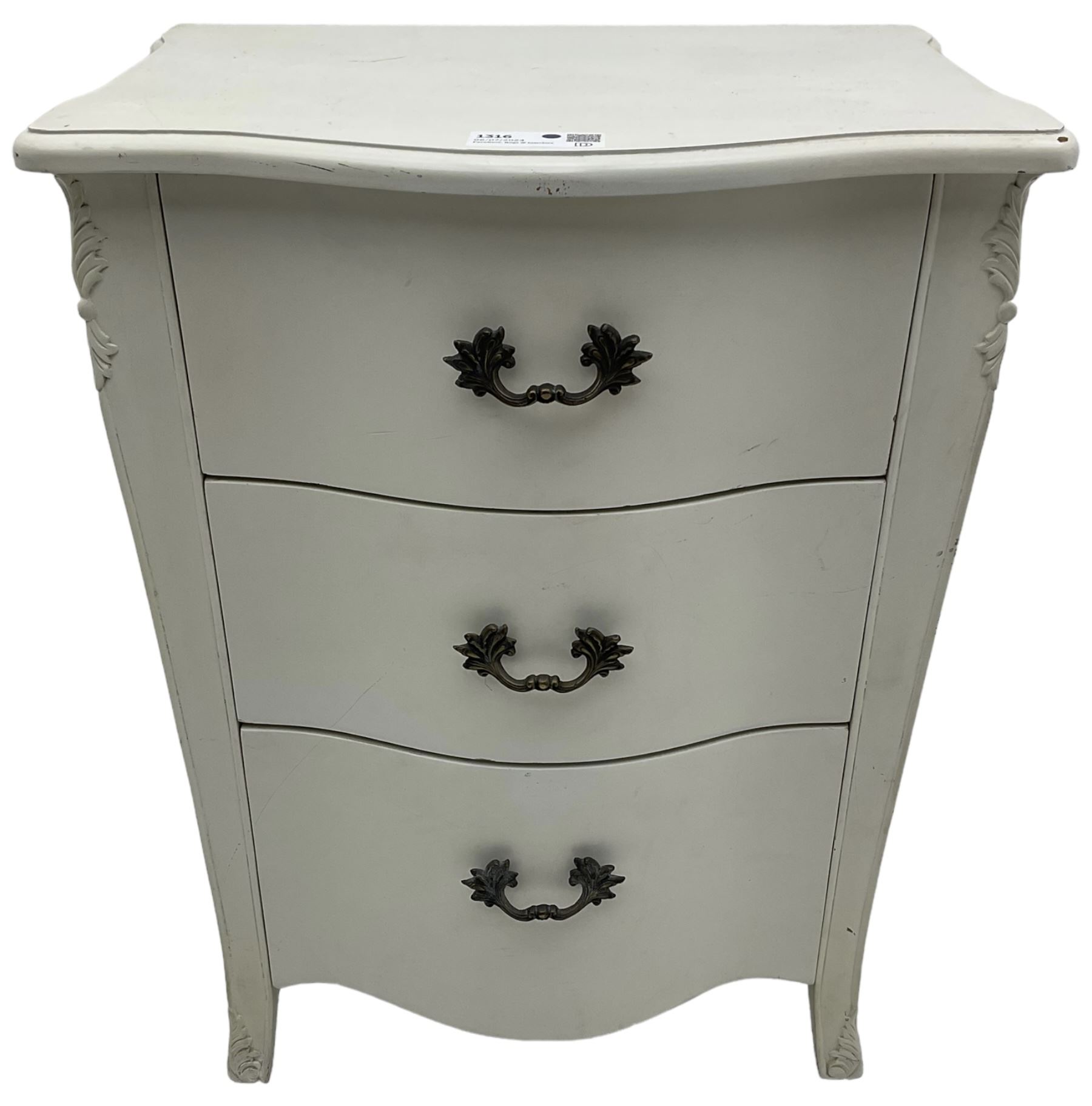 French design cream painted bedside chest, fitted with three drawers, with foliage decoration 