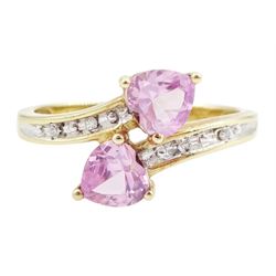 9ct gold two stone heart cut pink sapphire ring, with diamond set shoulders, hallmarked