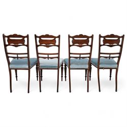 Edwardian inlaid mahogany and rosewood salon suite - two-seat sofa (W112cm, H90cm, D60cm); set of four side chairs (W44cm, H90cm); inlaid with scrolling foliate motifs, upholstered in light blue fabric, on turned supports inlaid with boxwood stringing