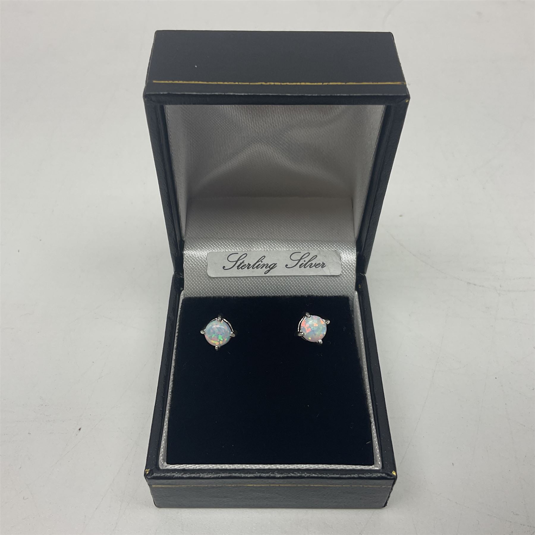 Pair of silver opal stud earrings, stamped 925, boxed 