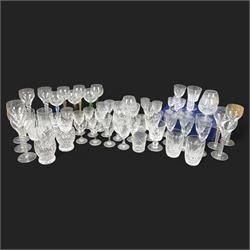 Set of eight wine glasses with twisted stems, together with another set of six wine glasse...