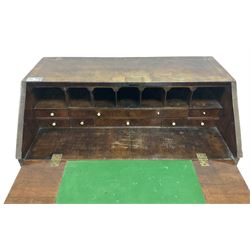 18th century walnut bureau, crossbanded and feather-banded rectangular top and fall-front, enclosing fitted interior with pigeonholes and correspondence drawers with bone handles, over two short and three long graduating drawers with moulded facias and original brass handles, on bracket feet