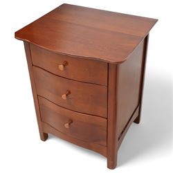 Willis & Gambier tall cherry wood serpentine front pedestal chest, fitted with five drawers, raised on square supports (W64cm D54cm H127cm); matching pair of bedside pedestal chests, fitted with three drawers (W52cm H66cm); and double headboard (W159cm) (4)