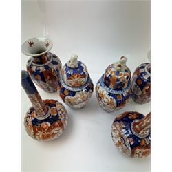 Three pairs of Imari vases, including a pair of baluster form with covers with foo dog finials, tallest H21cm 