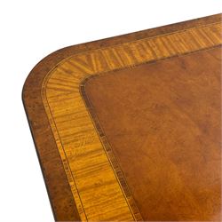 RBC Furniture (Made in England) - Georgian design mahogany dining table, rectangular top with rounded corners, satinwood and burr walnut bandings, two D-ends with two additional leaves and support rails, on barrel turned pedestals with four out-splayed reeded supports, brass cups and castors 