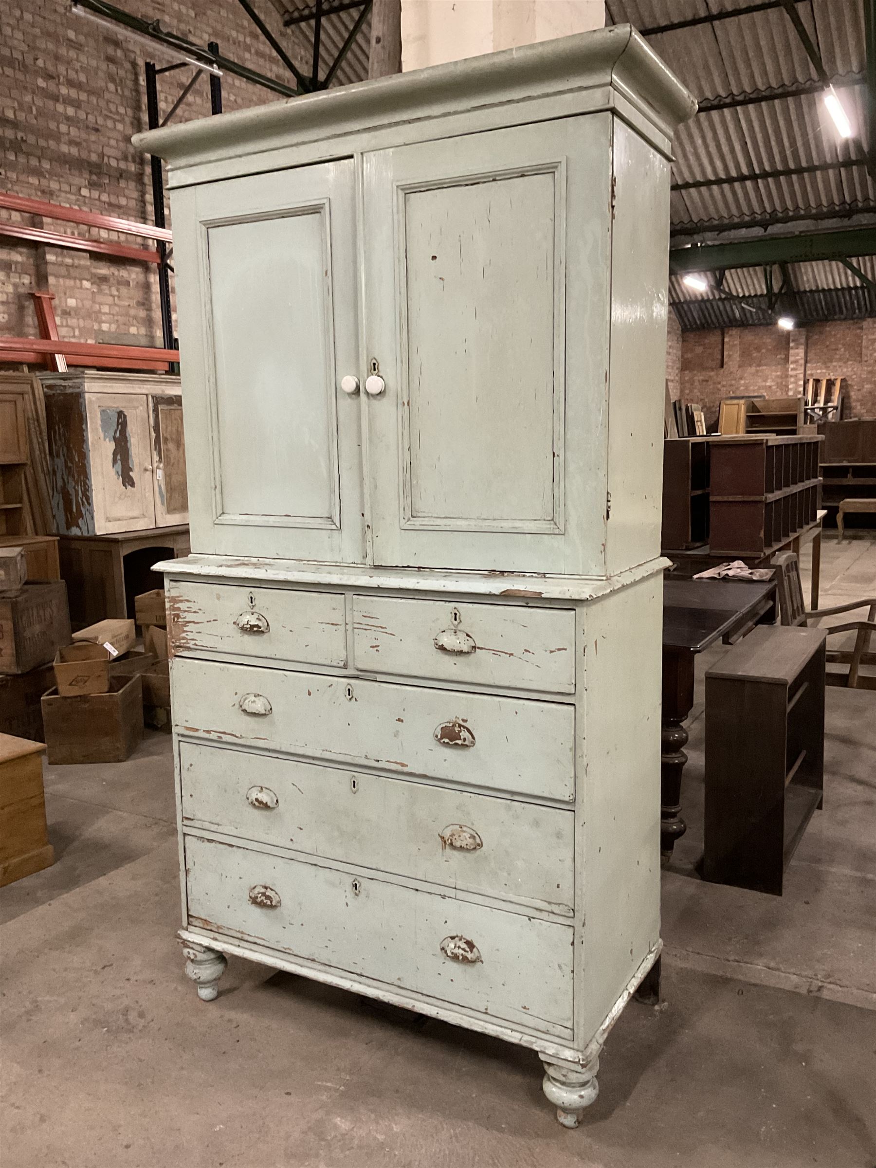 19th century pale blue painted pine housekeepers cupboard, double panelled cupboard enclosing two shelves over two short and three long drawers, on turned feet - THIS LOT IS TO BE COLLECTED BY APPOINTMENT FROM THE OLD BUFFER DEPOT, MELBOURNE PLACE, SOWERBY, THIRSK, YO7 1QY