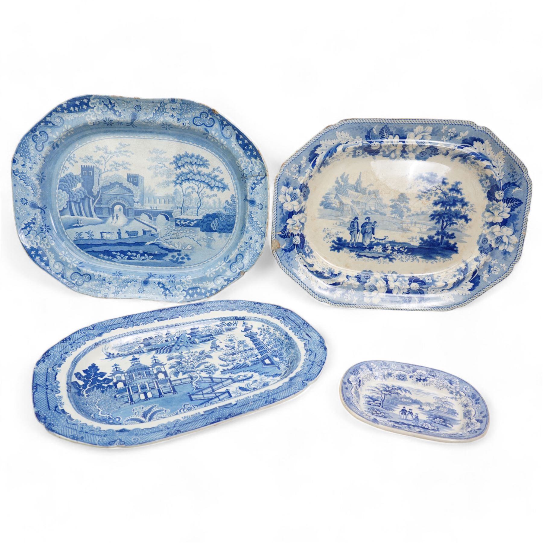 Early 19th century J & R Clews blue and white transfer printed meat plate, decorated in the Castle Pattern, L54cm, another decorated in 'The Villager' pattern, attributed to Turner, another meat plate and small oval stand (4)