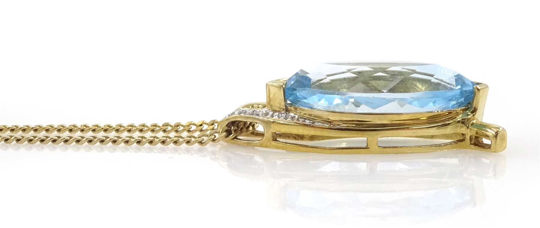 9ct gold marquise cut sky blue topaz and round brilliant cut diamond pendant necklace, hallmarked, topaz approx 7.35 carat