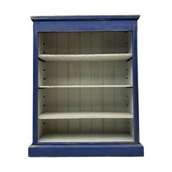 Pine blue painted open bookcase, moulded rectangular top over three white painted adjustable shelves, on plinth base