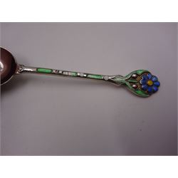 Set of twelve silver coffee spoons, each with enamelled blue flower to terminal and green and white enamel decoration to stem, hallmarked Mappin & Webb Ltd, Birmingham 1934, contained within fitted case